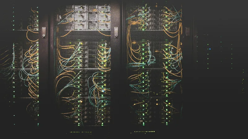Network cables and servers in a data center rack