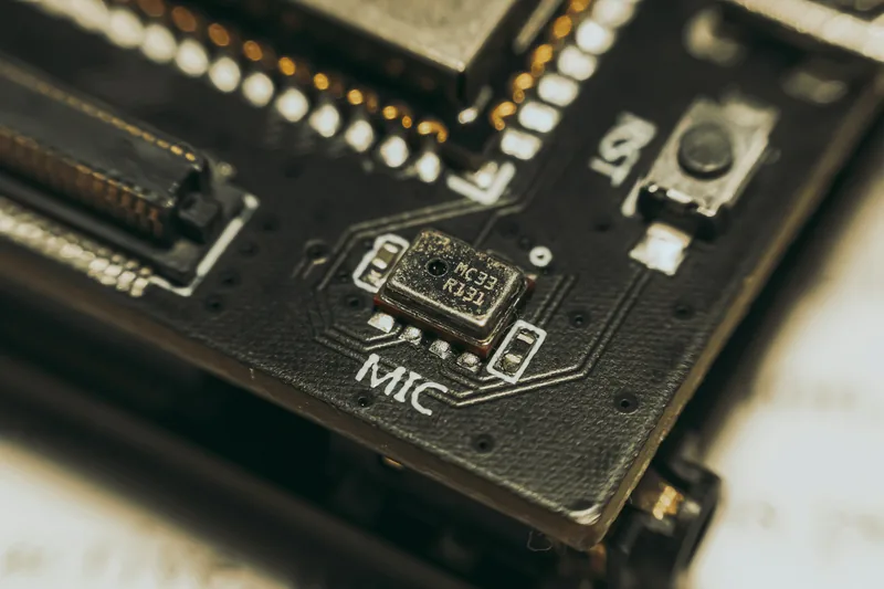 Close-up of a circuit board with a MEMS microphone and connectors