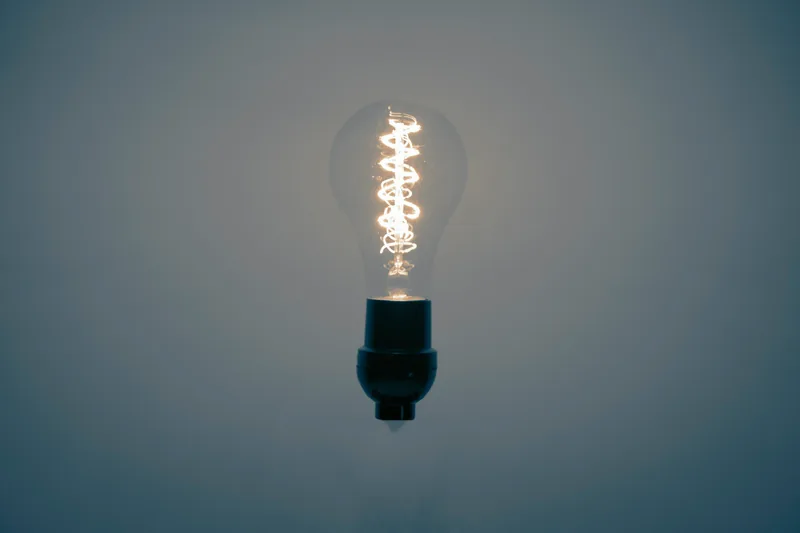A lit light bulb